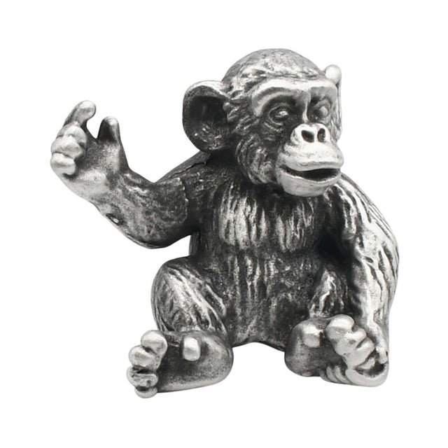 English made pewter seated chimpanzee figurine ornament with raised hand, front view XCSORN094