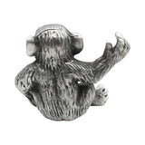 English made pewter chimpanzee ornament rear view showing sculpted fur and raised arm XCSORN094