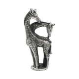 English made pewter pair of giraffes ornament with long intertwined necks front view XCSORN103