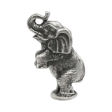 English made pewter circus elephant ornament balancing on round pedestal with raised trunk first view XCSORN105