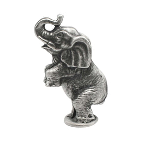 English made pewter circus elephant ornament balancing on round pedestal with raised trunk first view XCSORN105