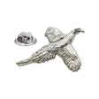 Shiny bright silver-coloured pheasant lapel pin in flight with detailed wings and butterfly clasp