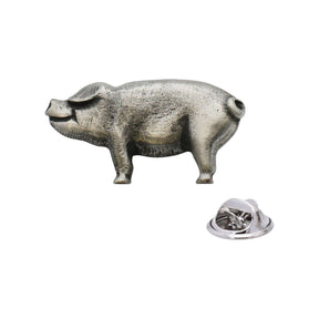 Antique silver-coloured standing pig lapel pin badge with curled tail and butterfly clasp