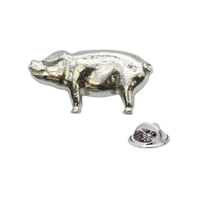 Shiny bright silver-coloured pig lapel pin badge with curled tail and butterfly clasp