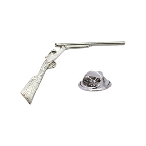 Shiny bright silver-coloured shotgun lapel pin with traditional sporting shotgun design and butterfly clasp