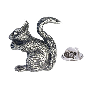 Antique silver-coloured squirrel lapel pin badge with curled bushy tail and butterfly fastening