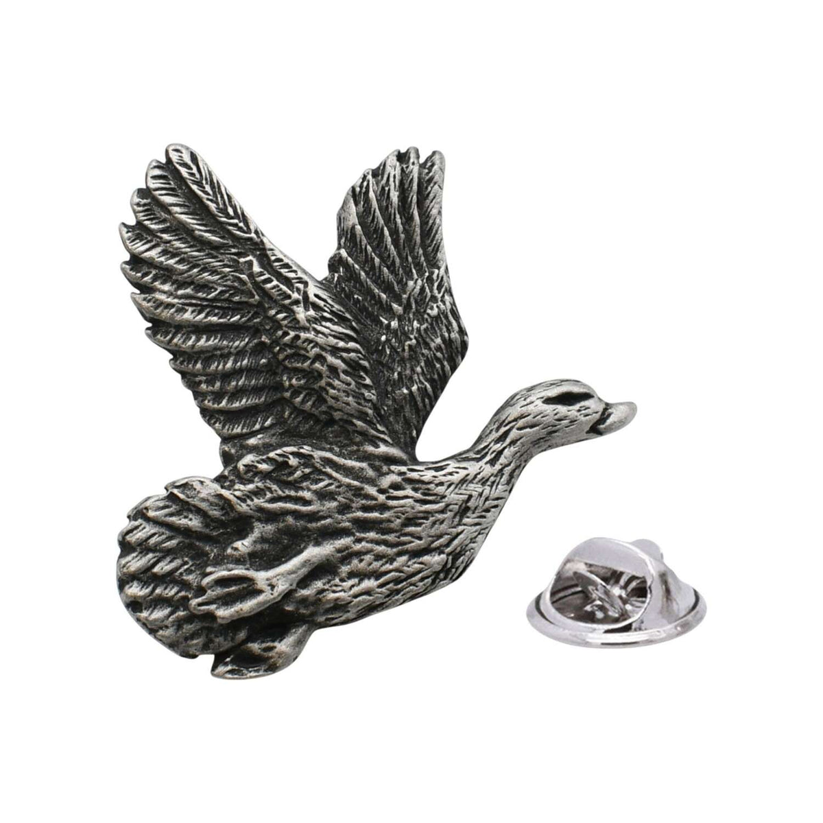 Antique silver-coloured teal duck lapel pin in flight with raised wings and butterfly fastening