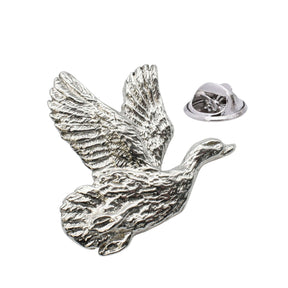 Shiny bright silver-coloured teal duck lapel pin in flight with raised wings and butterfly clasp