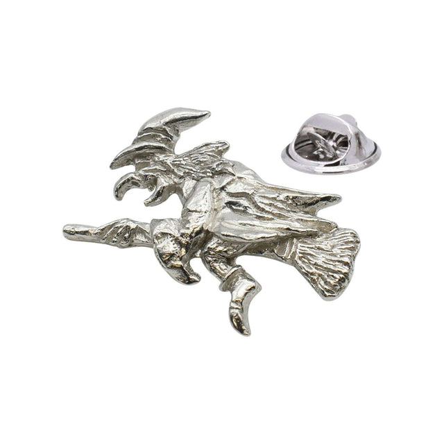 Shiny bright silver-coloured flying witch on broomstick lapel pin with butterfly clasp