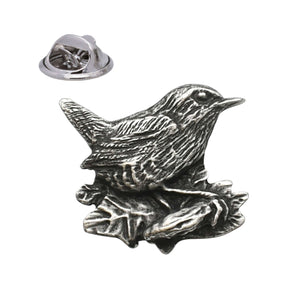 Antique silver-coloured wren bird lapel pin perched on a branch with butterfly clasp