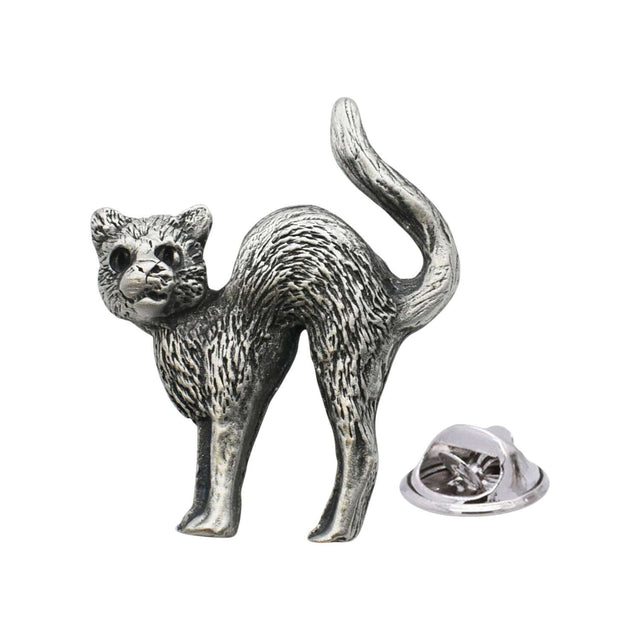 Antique silver-coloured cat lapel pin badge with arched back, raised tail and butterfly clasp