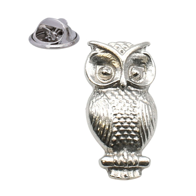 Shiny bright silver-coloured small owl lapel pin badge with large round eyes and butterfly clasp
