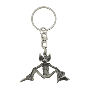 Piskie pewter keyring featuring seated folklore creature