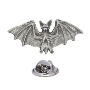 Antique silver-coloured flying bat lapel pin with detailed outstretched wings and butterfly clasp