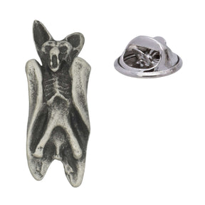 Antique silver-coloured hanging bat lapel pin with folded wings, pointed ears and butterfly clasp