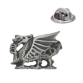 Antique silver-coloured Welsh dragon lapel pin badge with detailed wing, curled tail and butterfly clasp