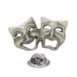 Antique silver-coloured comedy and tragedy theatre masks lapel pin badge with smiling and sad faces and butterfly clasp