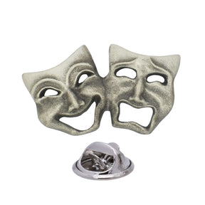 Antique silver-coloured comedy and tragedy theatre masks lapel pin badge with smiling and sad faces and butterfly clasp