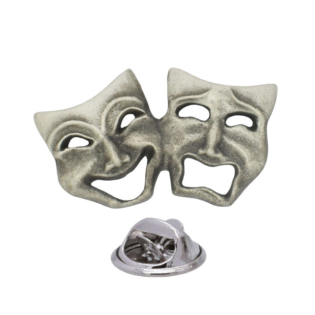 Antique silver-coloured comedy and tragedy theatre masks lapel pin badge with smiling and sad faces and butterfly clasp