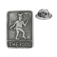 Antique silver-coloured The Fool tarot card lapel pin with jester figure, lettering and butterfly clasp