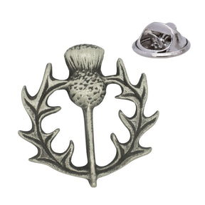 Antique silver-coloured Scottish thistle lapel pin with flower head, spiky leaves and butterfly clasp