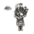 Antique silver-coloured Scottish bagpiper in Highland dress playing bagpipes, lapel pin with butterfly clasp