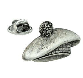 Antique silver-coloured Scottish Tam o Shanter bonnet lapel pin with pompom, patterned band and butterfly clasp