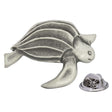 Antique silver-coloured sea turtle lapel pin with patterned shell, flippers and butterfly clasp