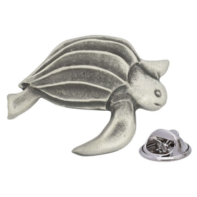 Antique silver-coloured sea turtle lapel pin with patterned shell, flippers and butterfly clasp
