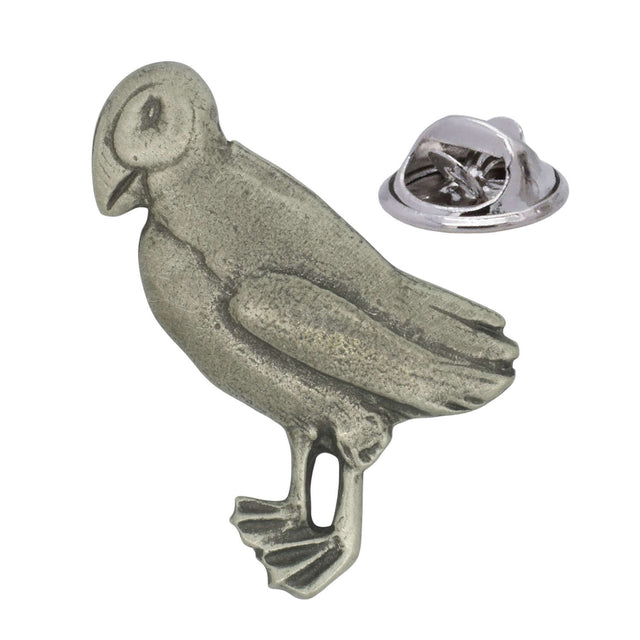 Antique silver-coloured puffin seabird lapel pin badge with distinctive beak, folded wing and butterfly clasp