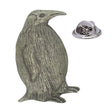 Antique silver-coloured penguin lapel pin badge with textured feathers and butterfly clasp