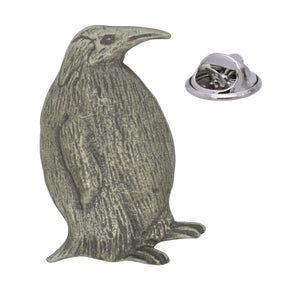 Antique silver-coloured penguin lapel pin badge with textured feathers and butterfly clasp