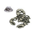 Scorpion pewter lapel pin badge with curled segmented tail, pincers and butterfly clasp