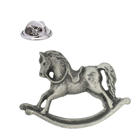 Antique silver pewter rocking horse lapel pin badge showing a traditional toy horse on curved rockers and a butterfly clasp