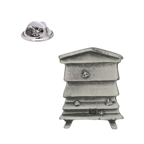 Traditional beehive pewter lapel pin badge with pitched roof and small bee details, shown with butterfly clasp
