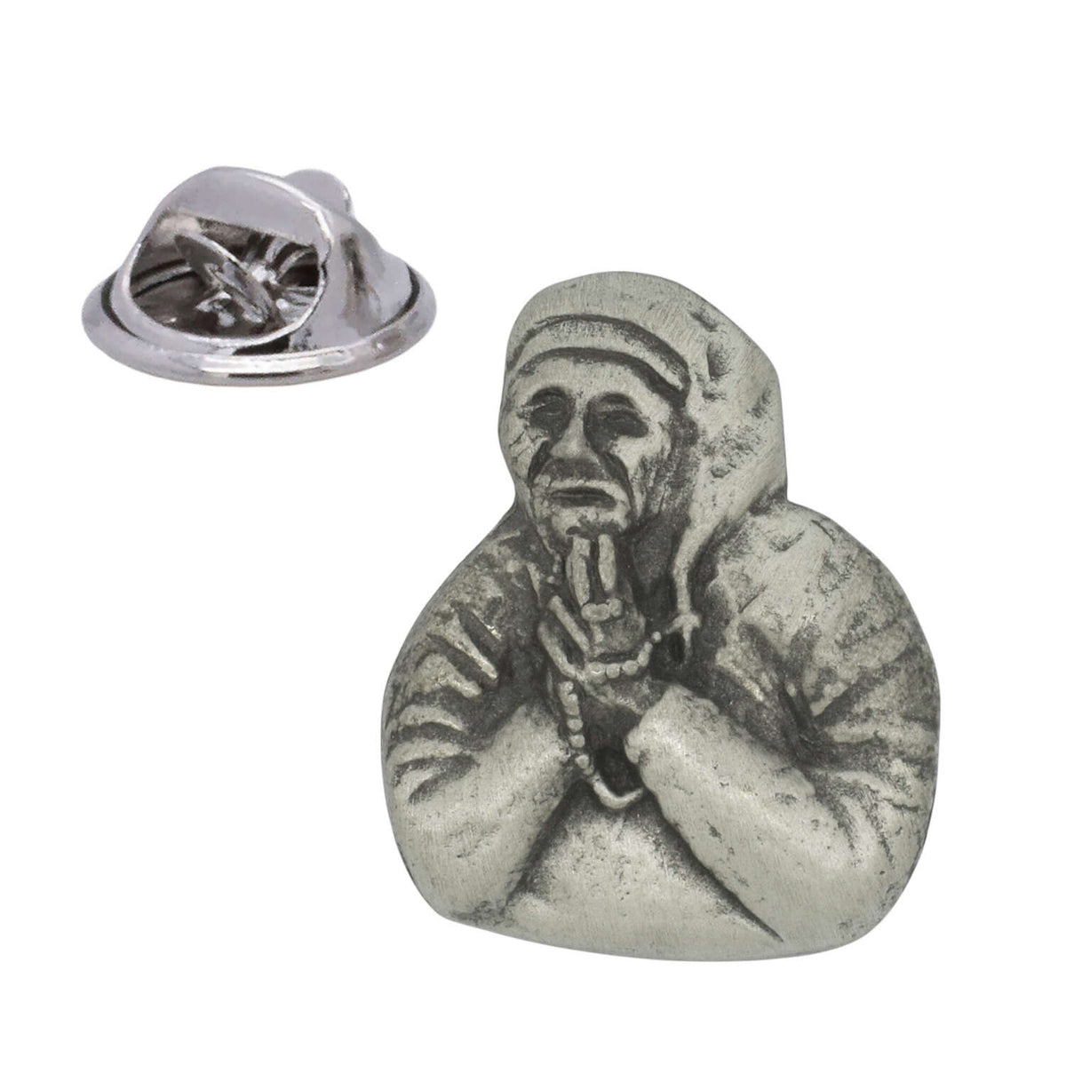 Mother Teresa pewter lapel pin badge showing her in a headscarf with hands clasped in prayer and butterfly clasp