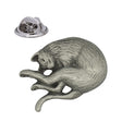 Curled stretching cat pewter lapel pin with textured fur and butterfly clasp